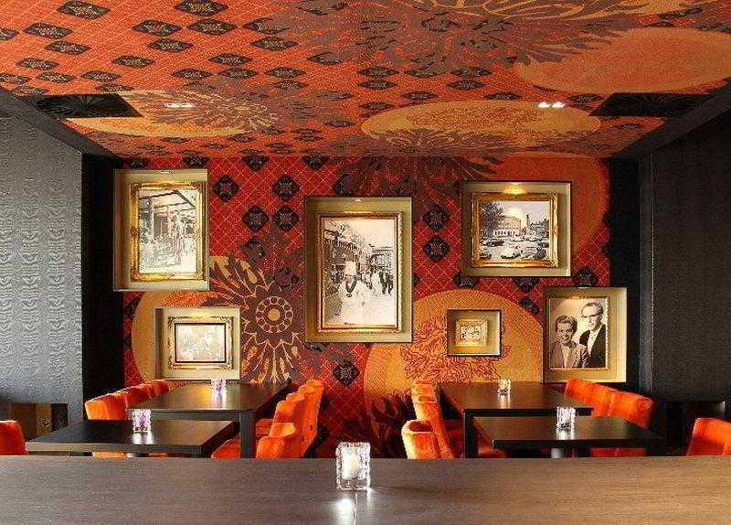 إميلورتْ Hotel Restaurant Grandcafe 'T Voorhuys المطعم الصورة